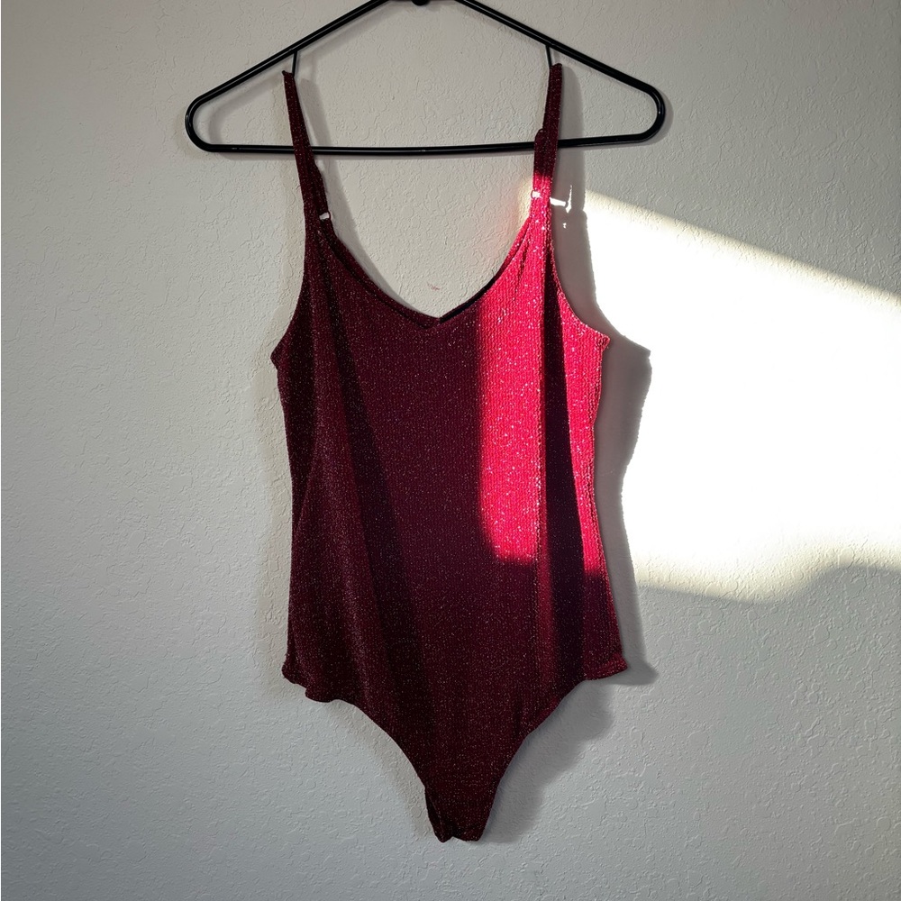Women’s Red Sparkly Bodysuit. Size M